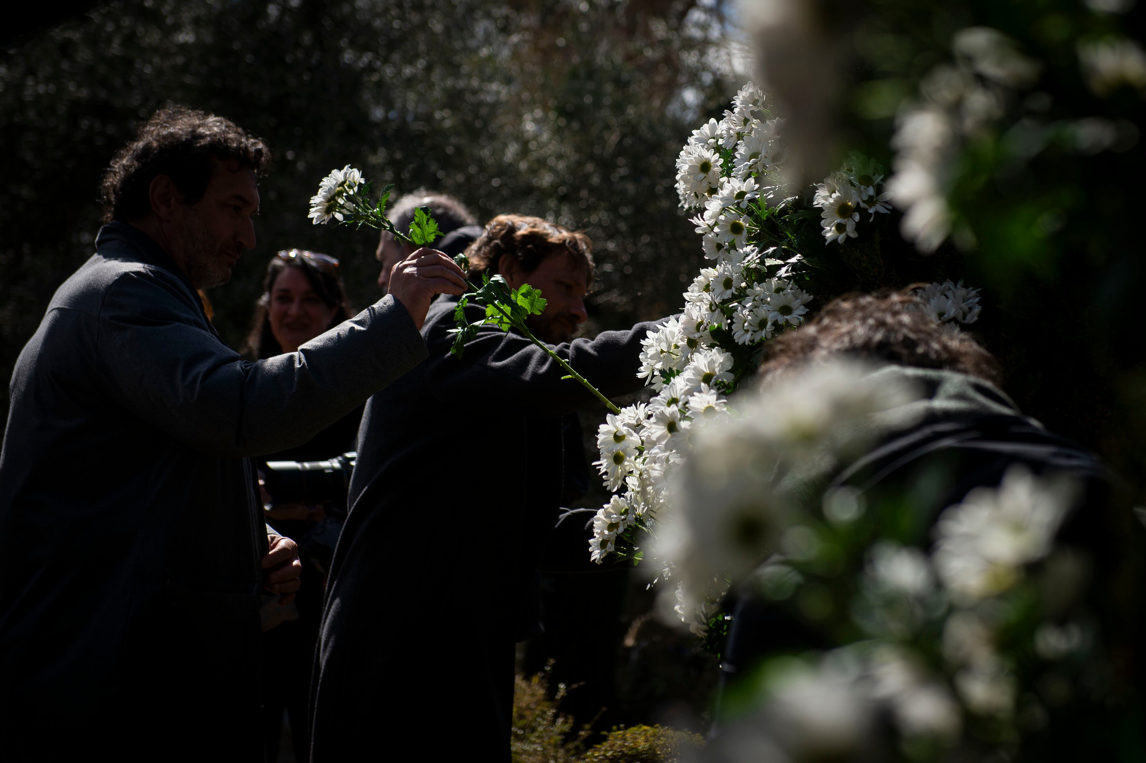 Homenaje a las víctimas de los atentados yihadista de Madrid, en el bosque El Recuerdo del parque El Retiro, el 11 de marzo de 2024.