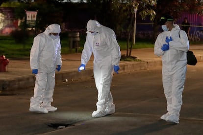 Investigators inspect the area of the attack on Miguel Uribe, on June 7, 2025.