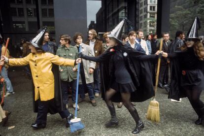 Yippie protesters dressed like witches outside the