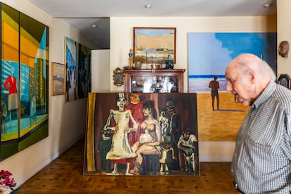 Joaquín Pacheco, at home full of his works.