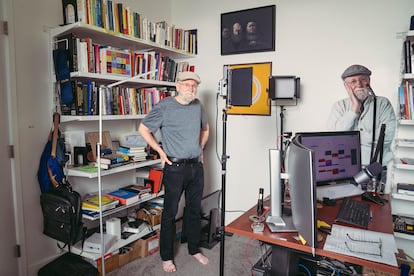 Don Norman poses in with a Don Norman cut-out in his San Diego home office.