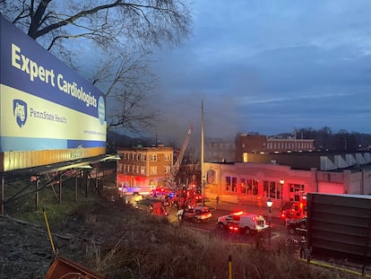 A general view shows smoke coming out from a chocolate factory after fire broke out, in West Reading, Pennsylvania