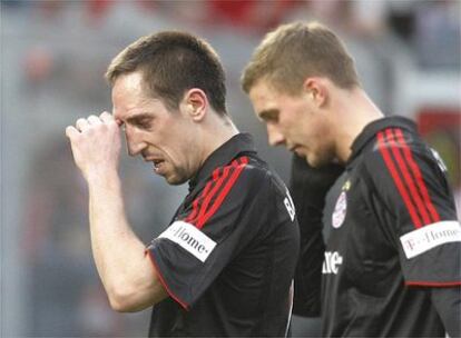 Ribery y Podolski desolados tras la derrota de su equipo