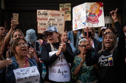 Teachers march to protest for wage increases in Caracas.