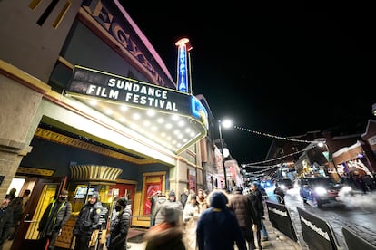 Pedestrians walk down Main Street in front of the Egyptian Theatre during the 2023 Sundance Film Festival on Saturday, Jan. 21, 2023, in Park City, Utah.