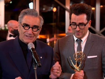 Eugene Levy, left, and Daniel Levy from "Schitt's Creek" accept the Emmy for Outstanding Comedy Series during the 72nd Emmy Awards telecast on Sunday, Sept. 20, 2020 at 8:00 PM EDT/5:00 PM PDT on ABC. (Invision for the Television Academy/AP) *** Local Caption *** .