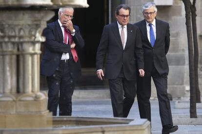 Mas, entre el fiscal superior de Catalunya, José María de Tejada, i el fiscal general de l'Estat, Eduardo Torres-Dulce, al juliol