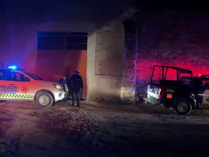 Police officers outside the site of a party where an armed group opened fire on partygoers attending a traditional Mexican party, in Salvatierra, Guanajuato, Mexico. December 17, 2023.