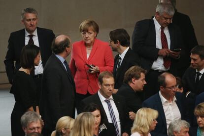 La canciller alemana Angela Merkel llega a votar durante el tercer paquete de ayuda financiera de la UE a Grecia en una sesión extraordinaria del parlamento alemán, el Bundestag, el 17 de julio de 2015 en Berlín (Alemania).