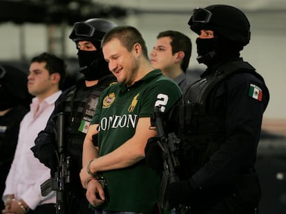 Cartel capo Édgar Valdez Villarreal, alias 'La Barbie', is presented in Mexico City after his arrest in 2010.