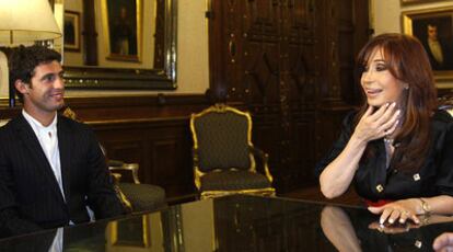 'Pechito López', junto a la presidenta Cristina Kirchner.