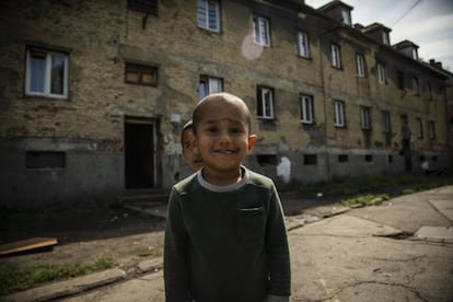 A child on Riegrova street. His grandmother, Mrs Horváthová, says living conditions have improved greatly since they arrived here seven years ago.