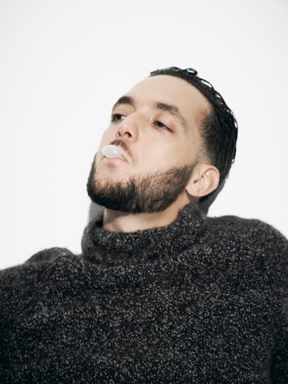 C. Tangana wears an Armani sweater.