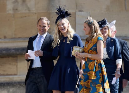 Chelsy Davy (en el centro) a su llegada a la boda de su ex, el príncipe Enrique, y Meghan Markle, el 19 de mayo de 2018 en el castillo de Windsor. 