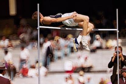 Dick Fosbury, of the United States, clears the bar in the high jump competition at the 1968 Mexico City Olympics.