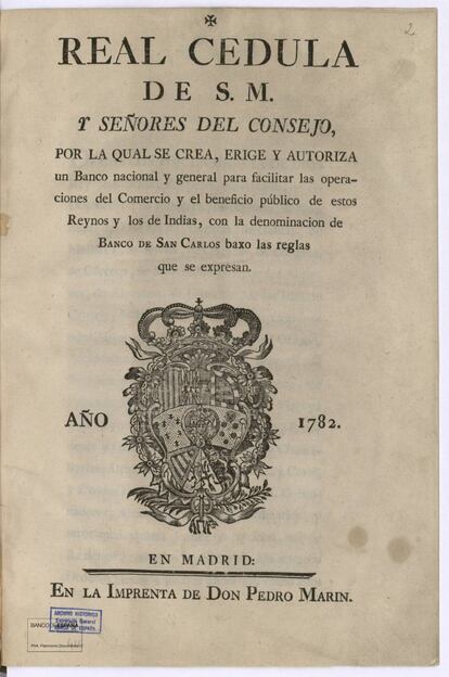 El antecesor del Banco de España fue el Banco de San Carlos que, como señala esta real cédula, se creó en 1782 como banco "nacional y general para facilitar las operaciones del comercio y el beneficio público de estos reinos y los de Indias".