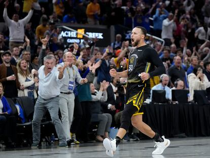 Golden State Warriors guard Stephen Curry (30) celebrates after making a 3-point basket during the second half of an NBA basketball game against the Milwaukee Bucks in San Francisco, Saturday, March 11, 2023.