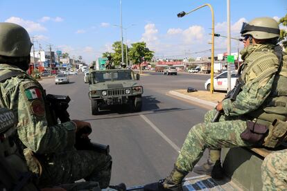 Soldiers patrol the streets of Culiacán on October 15.