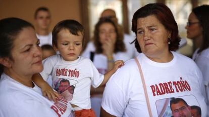 Father Toño’s mother, Carmen (right), next to his sister Marisa and a cousin in the Spanish town of Daimiel.