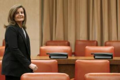 La ministra de Empleo y Seguridad Social, Fátima Báñez, a su llegada a la comisión correspondiente del Congreso.