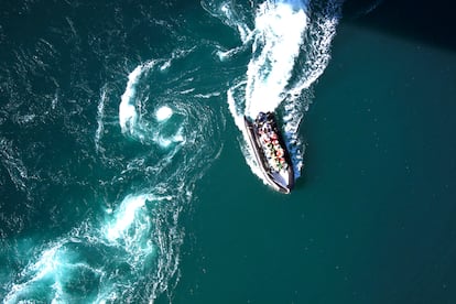 An inflatable boat in the whirlpool of the strait of Saltstraumen