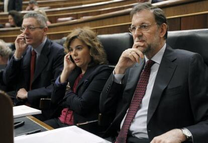 Mariano Rajoy, Soraya Sáenz de Santamaría y Alberto RuIz-Gallardón, este miércoles en el Congreso.