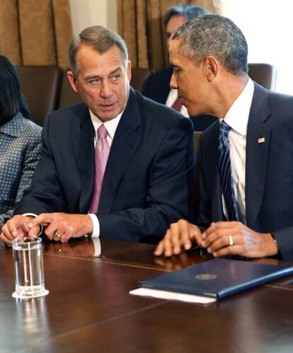 El líder republicano John Boehner, con el presidente Barak Obama.
