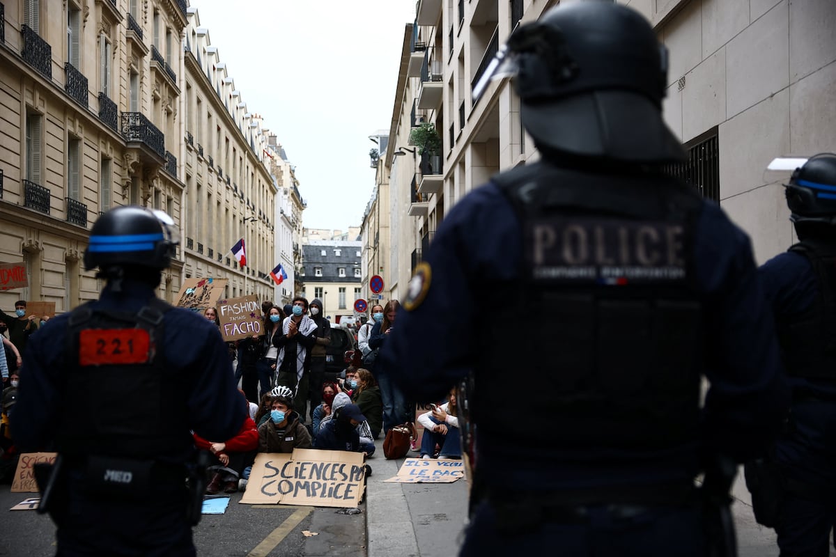 French PM announces budget cuts and aid to placate widespread protests