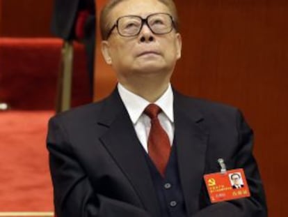 Jiang Zemin listens to a speech given by Hu Jintao in November 2012.