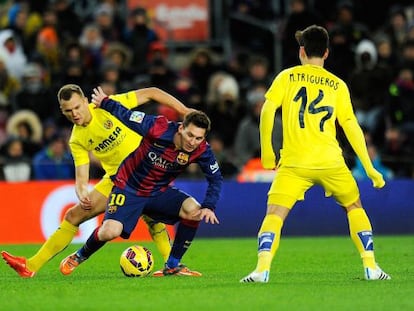 Cheryshev presiona a Messi durante un partido de Liga de la temporada pasada.