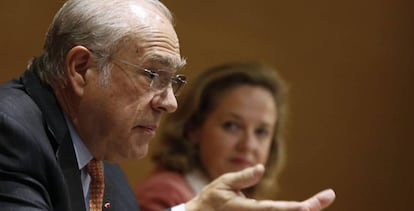 El secretario general de la OCDE, Ángel Gurría, y la vicepresidenta segunda Nadia Calviño.