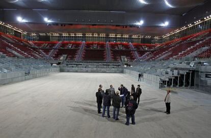 Representantes de la Federación Española en la Caja Mágica.