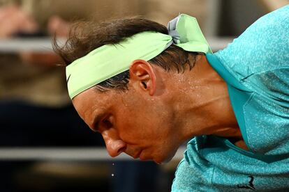 Sweat drips from Nadal's nose during his match against Alexander Zverev. 