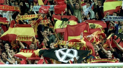 Fans hold up fascist banners during a match at the Bernabéu in 2002.