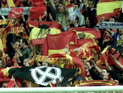 Fans hold up fascist banners during a match at the Bernabéu in 2002.