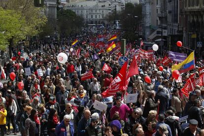 People march during the Labor Day rally in Madrid.