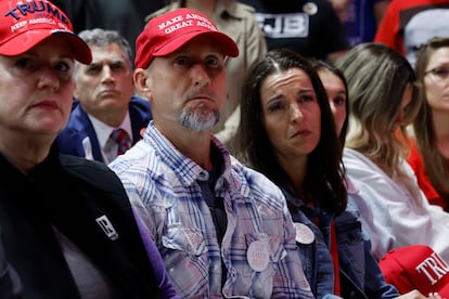 Laken Riley's parents Jason Riley (C) and Allyson Philips attend Republican presidential candidate and former U.S. President Donald Trump's campaign rally at the Forum River Center March 09, 2024 in Rome, Georgia