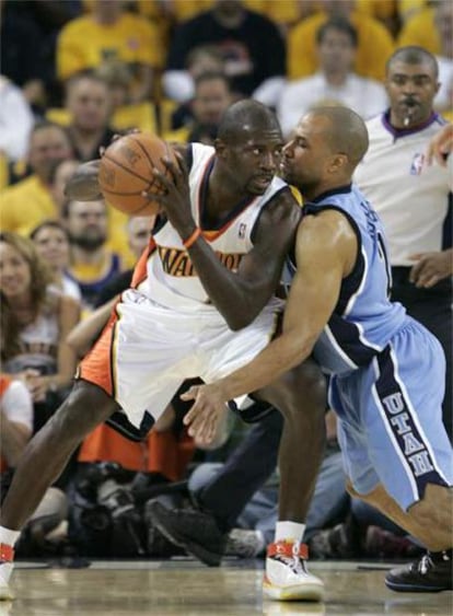 Derek Fisher y Jason Richardson, durante el encuentro