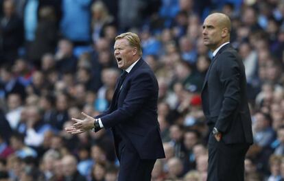 Koeman y Guardiola durante el partido en el Etihad.