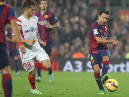 Xavi, en un partido de Liga contra el Sevilla esta temporada.