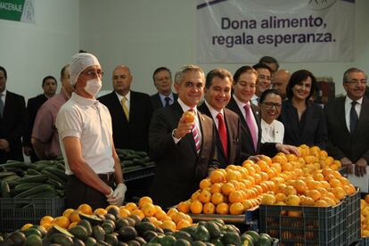 Miguel Ángel Mancera, jefe del Gobierno de la Ciudad de México de 2012 a 2018 junto a Julio Cesar Serna, en una imagen de archivo.