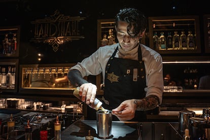 Javier Rodríguez, one of the bartenders at Handshake Speakeasy, prepares a cocktail on Tuesday in Mexico City.