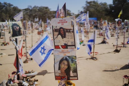 Photographs commemorating Eden Yerushalmi on the Esplanade, where the Nova festival was held, where he was kidnapped.