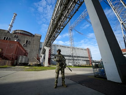 A Russian serviceman guards in an area of the Zaporizhzhia Nuclear Power Station in territory under Russian military control, southeastern Ukraine