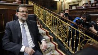 El presidente del Gobierno, Mariano Rajoy, poco antes de intervenir hoy en el Congreso de los Diputados.