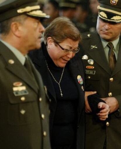 Magdalena Rivas, mother of army Major Elkin Hernández who was murdered by the FARC on November 26, 2011, cries at his funeral.