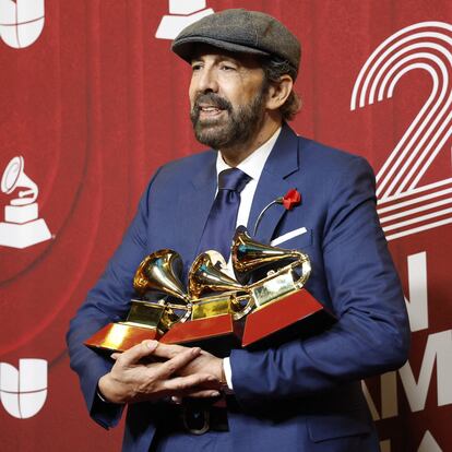 Juan Luis Guerra poses with Best Tropical Song and Record Of The Year for "Mambo 23", and Best merenguebachata album for Radio Guira at the 25th Annual Latin Grammy Awards in Miami, Florida, U.S., November 14, 2024. REUTERS/Marco Bello