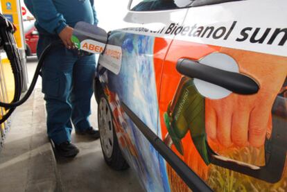 A driver refueling an ethanol-powered vehicle.