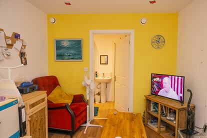 View of Trevor’s living room and bathroom. The bedroom is at the back.