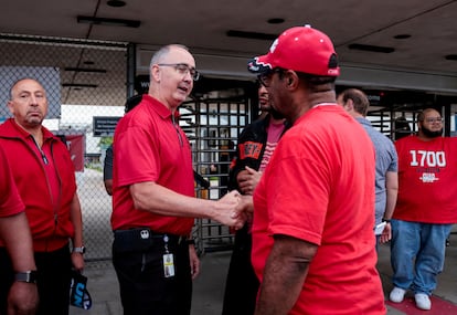 United Auto Workers President Shawn Fain greets UAW autoworkers, at the Stellantis Sterling Heights Assembly Plant, to mark the beginning of contract negotiations in Sterling Heights, Michigan, U.S. July 12, 2023.